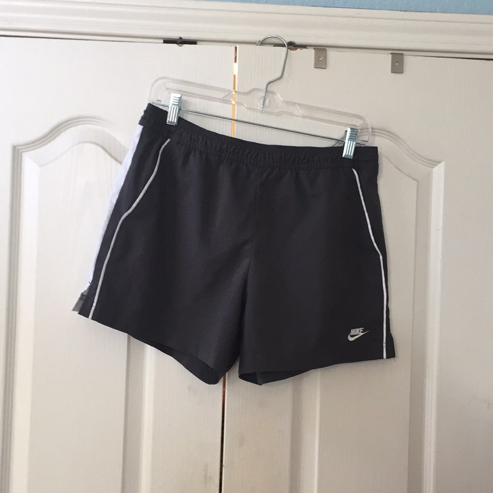 Gray Nike shorts with front pockets